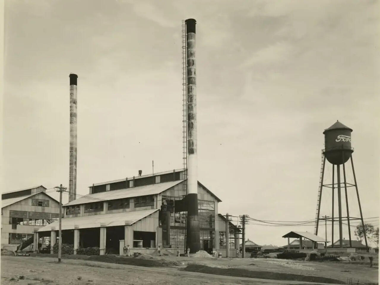 Fordlandia&#39;s rubber plant and water tower with the Ford logo (Courtesy of The Henry Ford)
